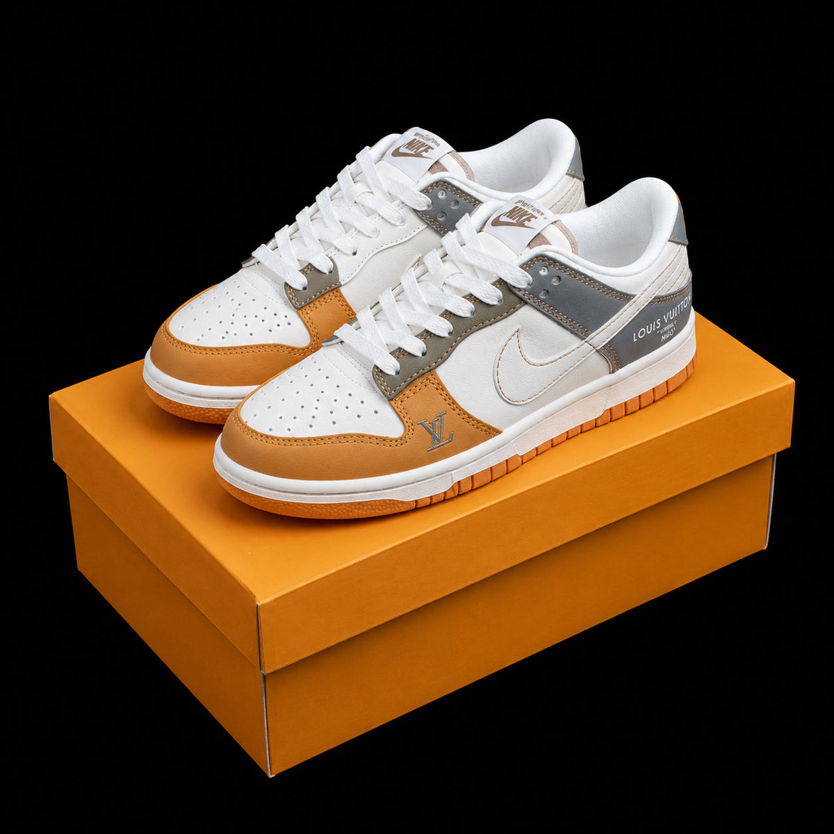Dunk Low en blanco, naranja y gris